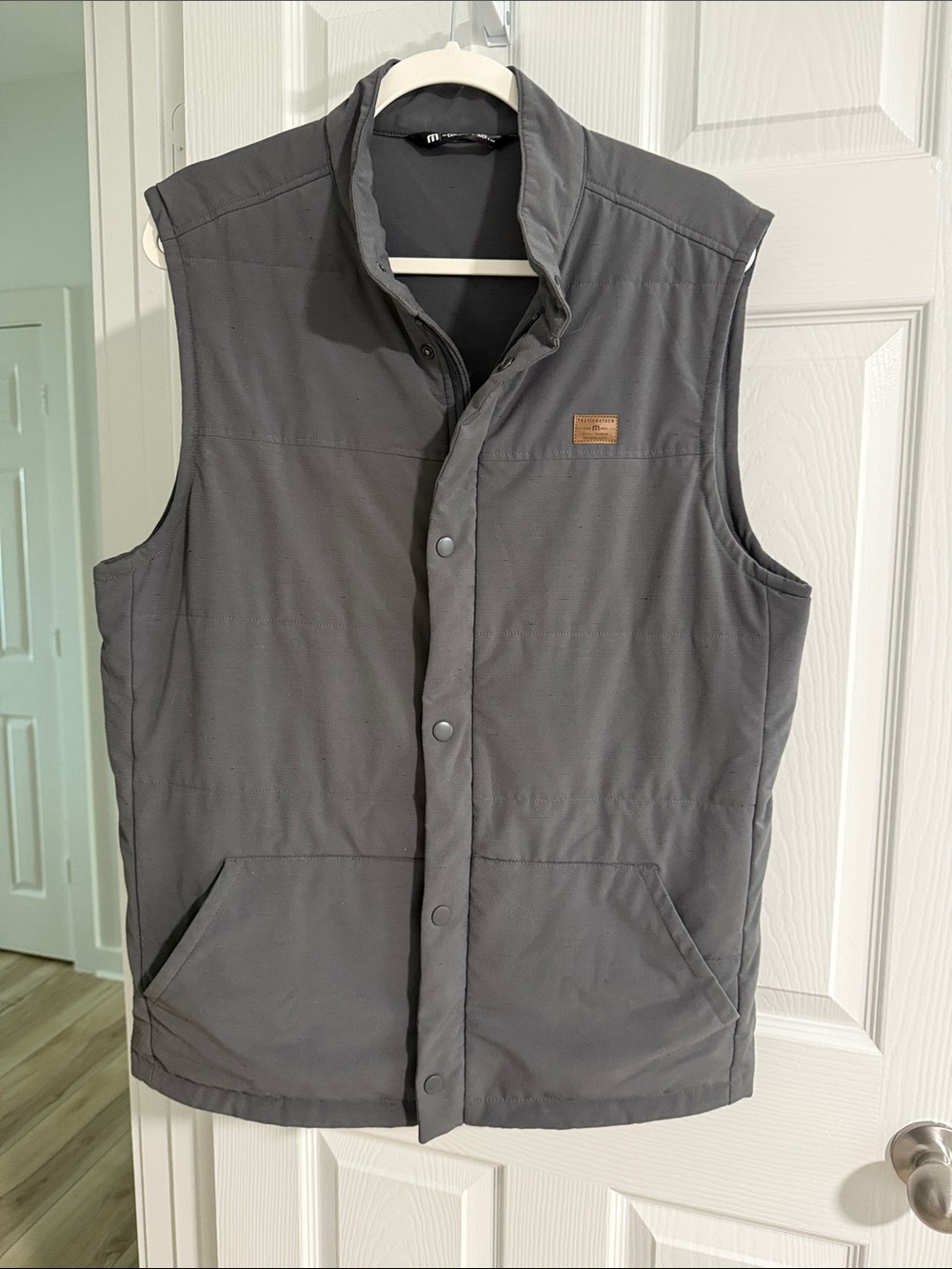 Travis Mathew Quilted Vest with Tan Leather Logo on Gray